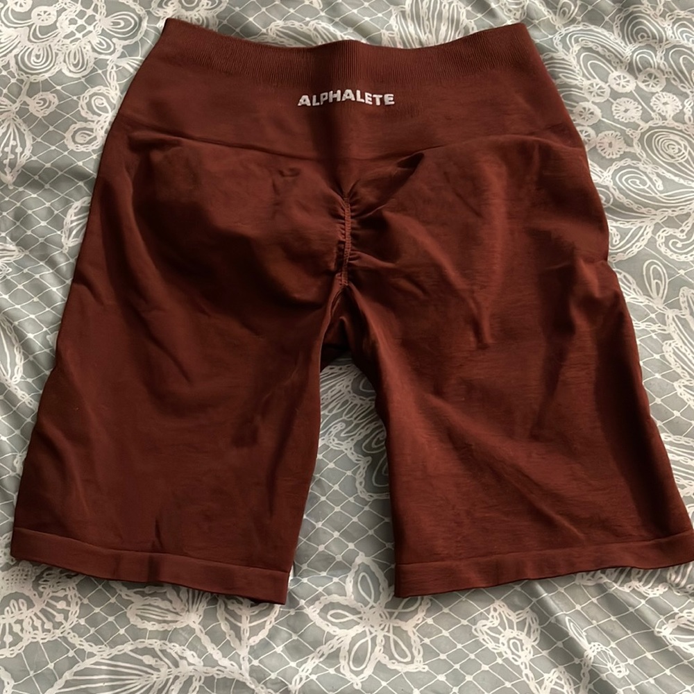 Alphalete Amplify Biker Shorts in Copper
